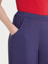 Pantalone a palazzo con tasche e micro pattern in Ecoseta  Rossi Donna - Ragno